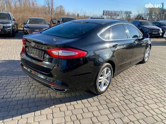 Форд Мондео, объемом двигателя 2 л и пробегом 131 тыс. км за 9900 $, фото 7 на Automoto.ua