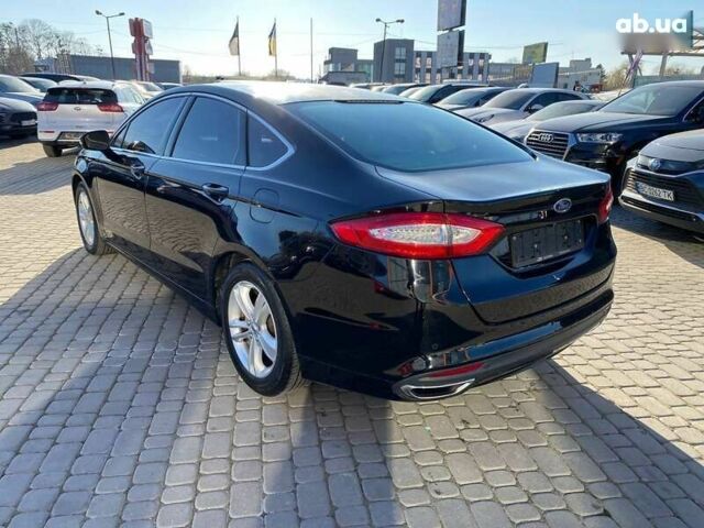 Форд Мондео, объемом двигателя 2 л и пробегом 131 тыс. км за 9900 $, фото 5 на Automoto.ua