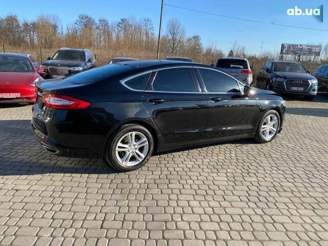 Форд Мондео, объемом двигателя 2 л и пробегом 131 тыс. км за 9900 $, фото 8 на Automoto.ua