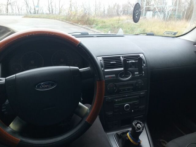 Серый Форд Мондео, объемом двигателя 1.8 л и пробегом 290 тыс. км за 1600 $, фото 10 на Automoto.ua