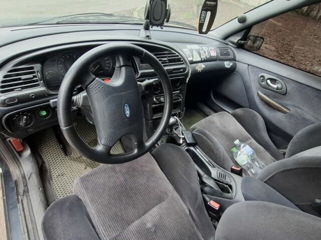 Сірий Форд Мондео, об'ємом двигуна 2 л та пробігом 250 тис. км за 1500 $, фото 4 на Automoto.ua