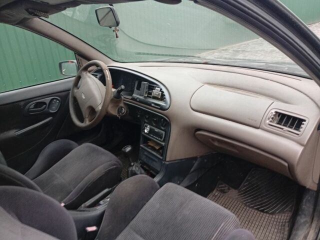 Сірий Форд Мондео, об'ємом двигуна 1.8 л та пробігом 416 тис. км за 643 $, фото 5 на Automoto.ua