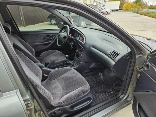 Серый Форд Мондео, объемом двигателя 2 л и пробегом 345 тыс. км за 1500 $, фото 4 на Automoto.ua