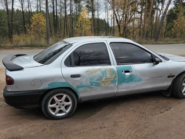 Серый Форд Мондео, объемом двигателя 1.8 л и пробегом 333 тыс. км за 750 $, фото 2 на Automoto.ua