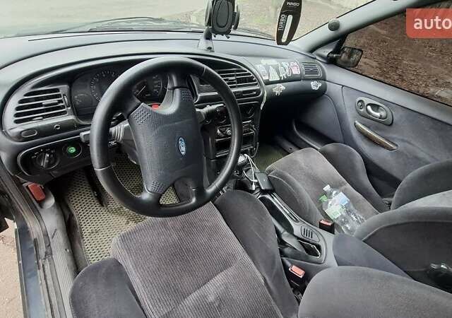 Серый Форд Мондео, объемом двигателя 2 л и пробегом 250 тыс. км за 1500 $, фото 3 на Automoto.ua