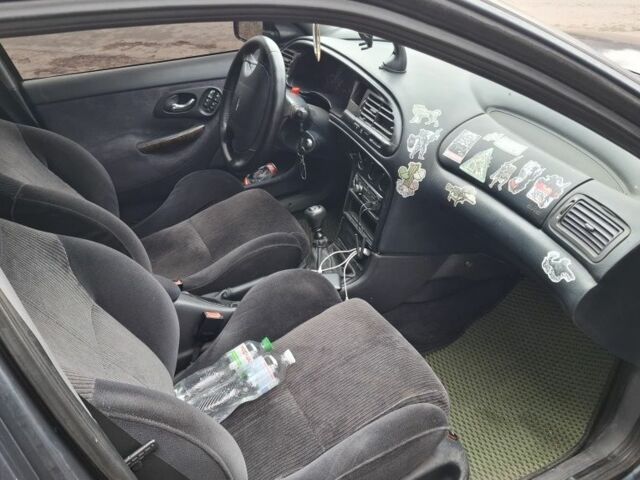 Сірий Форд Мондео, об'ємом двигуна 2 л та пробігом 250 тис. км за 1500 $, фото 5 на Automoto.ua