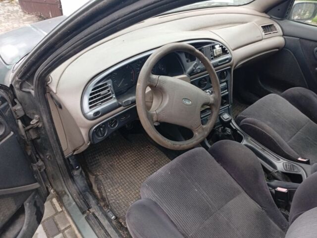 Сірий Форд Мондео, об'ємом двигуна 1.8 л та пробігом 416 тис. км за 643 $, фото 3 на Automoto.ua