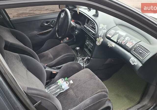 Серый Форд Мондео, объемом двигателя 2 л и пробегом 250 тыс. км за 1500 $, фото 4 на Automoto.ua