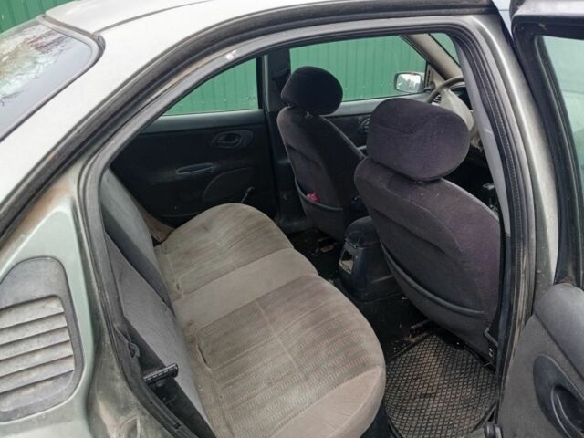 Сірий Форд Мондео, об'ємом двигуна 1.8 л та пробігом 416 тис. км за 643 $, фото 4 на Automoto.ua