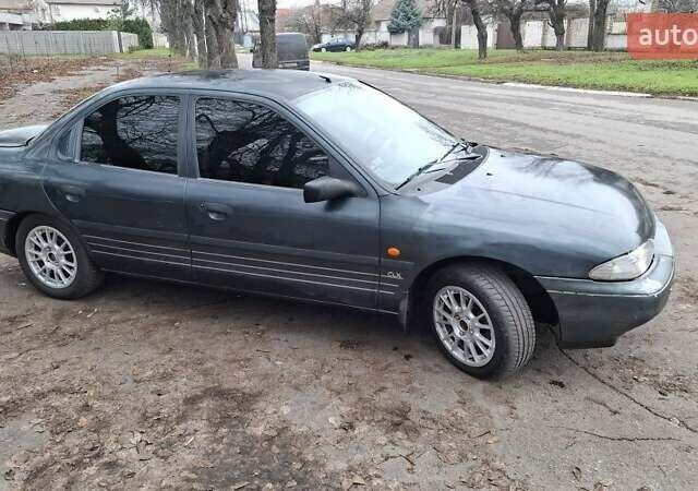 Серый Форд Мондео, объемом двигателя 2 л и пробегом 250 тыс. км за 1500 $, фото 1 на Automoto.ua