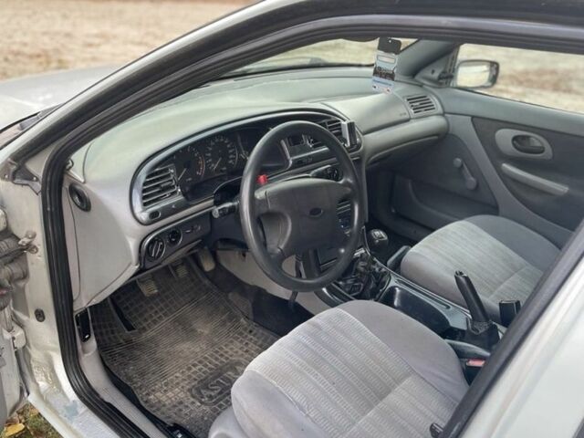 Сірий Форд Мондео, об'ємом двигуна 1.8 л та пробігом 200 тис. км за 1600 $, фото 9 на Automoto.ua