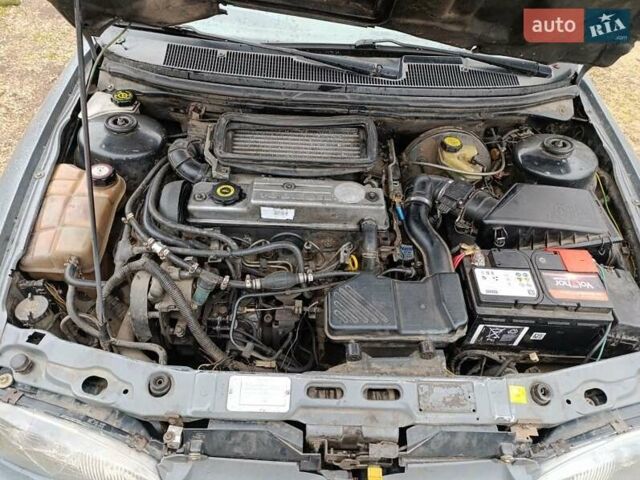 Серый Форд Мондео, объемом двигателя 1.8 л и пробегом 438 тыс. км за 900 $, фото 6 на Automoto.ua