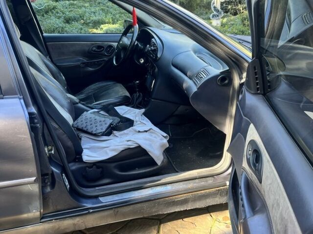 Серый Форд Мондео, объемом двигателя 2 л и пробегом 150 тыс. км за 1250 $, фото 3 на Automoto.ua