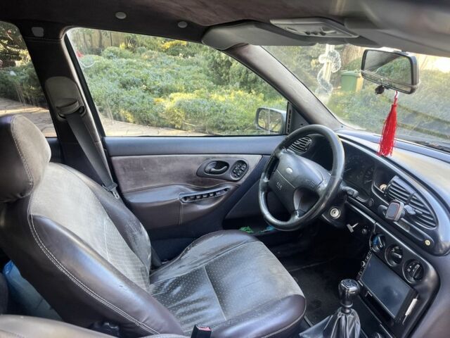 Серый Форд Мондео, объемом двигателя 2 л и пробегом 150 тыс. км за 1250 $, фото 4 на Automoto.ua