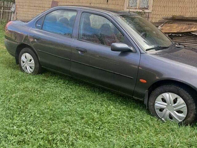 Сірий Форд Мондео, об'ємом двигуна 1.8 л та пробігом 300 тис. км за 1200 $, фото 1 на Automoto.ua