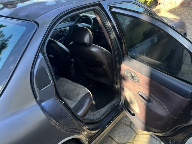 Серый Форд Мондео, объемом двигателя 2 л и пробегом 150 тыс. км за 1250 $, фото 2 на Automoto.ua