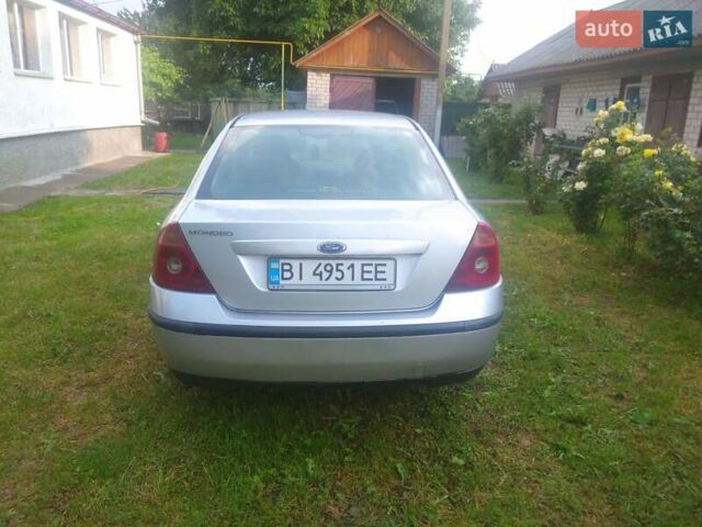Сірий Форд Мондео, об'ємом двигуна 2 л та пробігом 328 тис. км за 4500 $, фото 4 на Automoto.ua