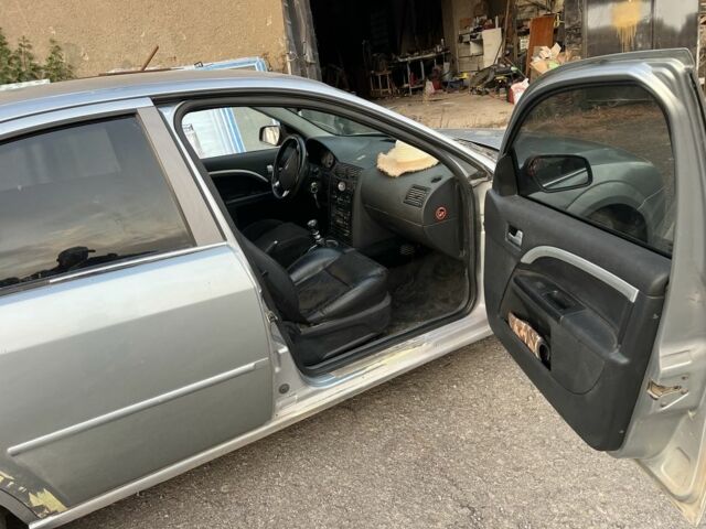 Серый Форд Мондео, объемом двигателя 2.5 л и пробегом 290 тыс. км за 3000 $, фото 6 на Automoto.ua