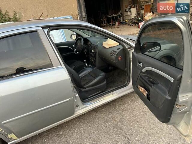 Серый Форд Мондео, объемом двигателя 2.5 л и пробегом 290 тыс. км за 3000 $, фото 1 на Automoto.ua