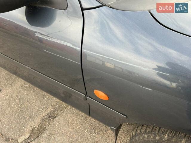 Серый Форд Мондео, объемом двигателя 1.6 л и пробегом 261 тыс. км за 2700 $, фото 11 на Automoto.ua