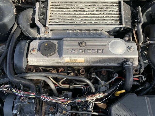 Серый Форд Мондео, объемом двигателя 1.8 л и пробегом 211 тыс. км за 1200 $, фото 7 на Automoto.ua