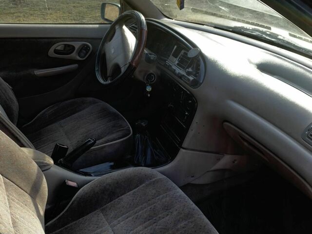 Серый Форд Мондео, объемом двигателя 1.8 л и пробегом 211 тыс. км за 1200 $, фото 4 на Automoto.ua