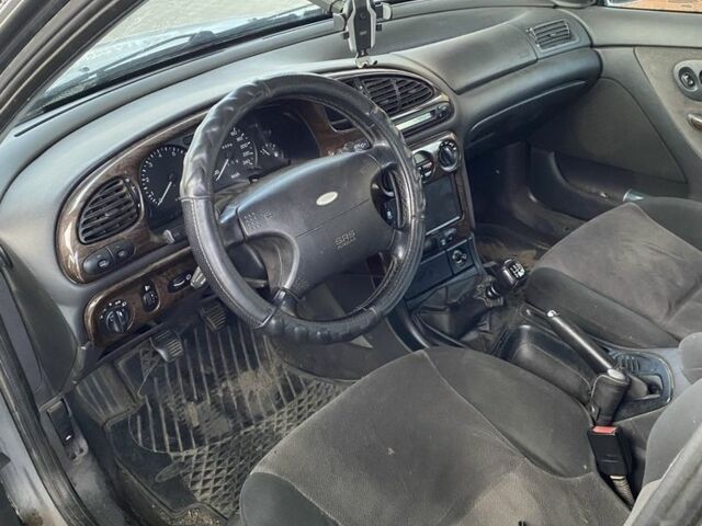 Серый Форд Мондео, объемом двигателя 1.8 л и пробегом 250 тыс. км за 1500 $, фото 6 на Automoto.ua