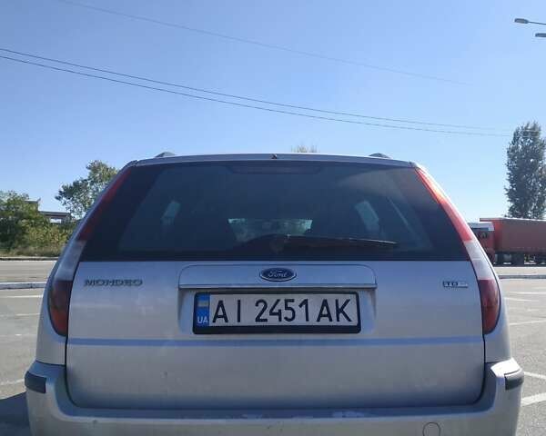 Сірий Форд Мондео, об'ємом двигуна 2 л та пробігом 199 тис. км за 3999 $, фото 75 на Automoto.ua