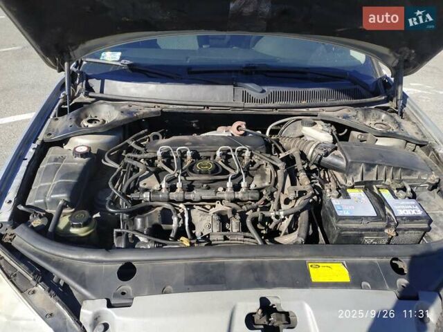 Сірий Форд Мондео, об'ємом двигуна 2 л та пробігом 199 тис. км за 3999 $, фото 69 на Automoto.ua