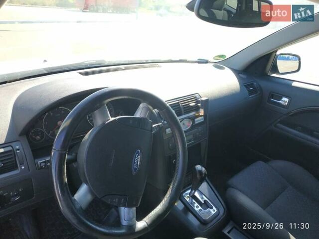 Сірий Форд Мондео, об'ємом двигуна 2 л та пробігом 199 тис. км за 3999 $, фото 65 на Automoto.ua