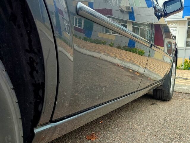 Сірий Форд Мондео, об'ємом двигуна 1.8 л та пробігом 259 тис. км за 5600 $, фото 3 на Automoto.ua