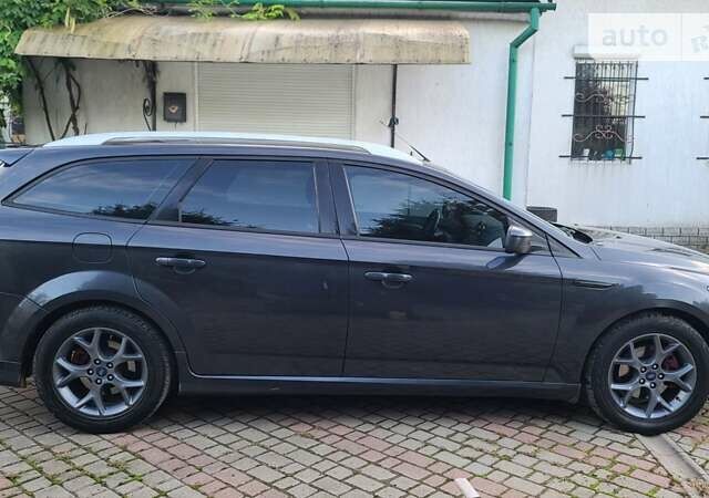 Сірий Форд Мондео, об'ємом двигуна 2.2 л та пробігом 252 тис. км за 9333 $, фото 7 на Automoto.ua