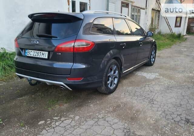 Сірий Форд Мондео, об'ємом двигуна 2.2 л та пробігом 252 тис. км за 9333 $, фото 5 на Automoto.ua