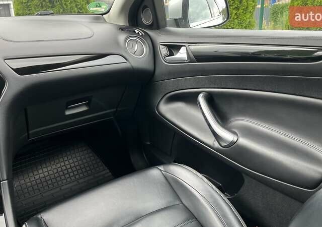 Сірий Форд Мондео, об'ємом двигуна 2 л та пробігом 216 тис. км за 10799 $, фото 27 на Automoto.ua