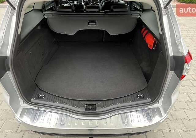 Сірий Форд Мондео, об'ємом двигуна 2 л та пробігом 216 тис. км за 10799 $, фото 21 на Automoto.ua