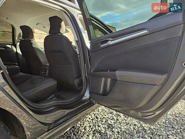 Сірий Форд Мондео, об'ємом двигуна 2 л та пробігом 249 тис. км за 11300 $, фото 48 на Automoto.ua