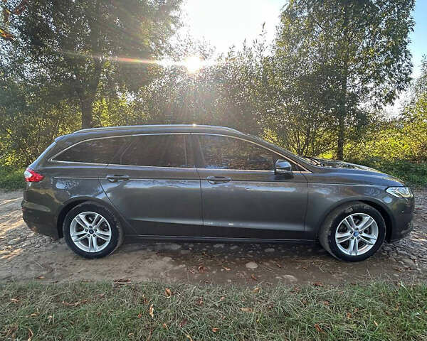 Серый Форд Мондео, объемом двигателя 2 л и пробегом 292 тыс. км за 12700 $, фото 12 на Automoto.ua