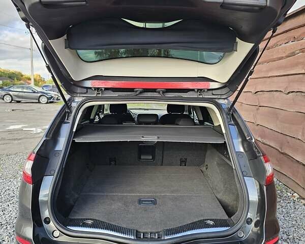 Сірий Форд Мондео, об'ємом двигуна 2 л та пробігом 249 тис. км за 11300 $, фото 53 на Automoto.ua