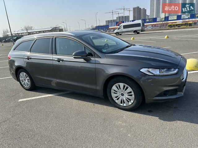 Сірий Форд Мондео, об'ємом двигуна 2 л та пробігом 243 тис. км за 14966 $, фото 4 на Automoto.ua