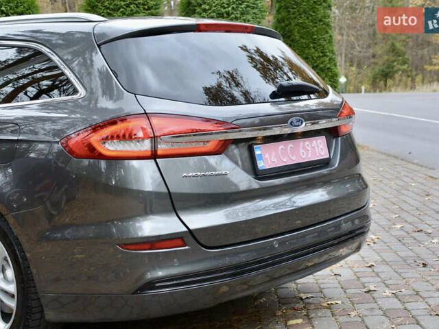 Сірий Форд Мондео, об'ємом двигуна 2 л та пробігом 244 тис. км за 12800 $, фото 29 на Automoto.ua