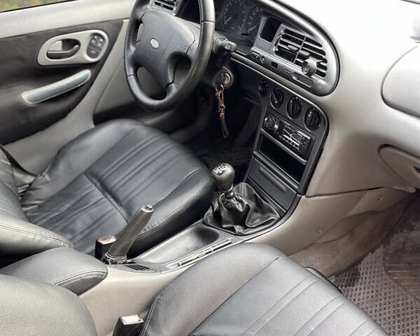 Серый Форд Мондео, объемом двигателя 1.8 л и пробегом 351 тыс. км за 1799 $, фото 7 на Automoto.ua