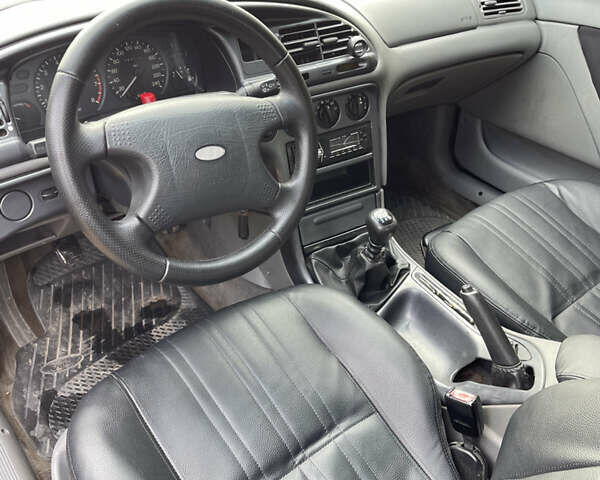 Серый Форд Мондео, объемом двигателя 1.8 л и пробегом 351 тыс. км за 1799 $, фото 10 на Automoto.ua