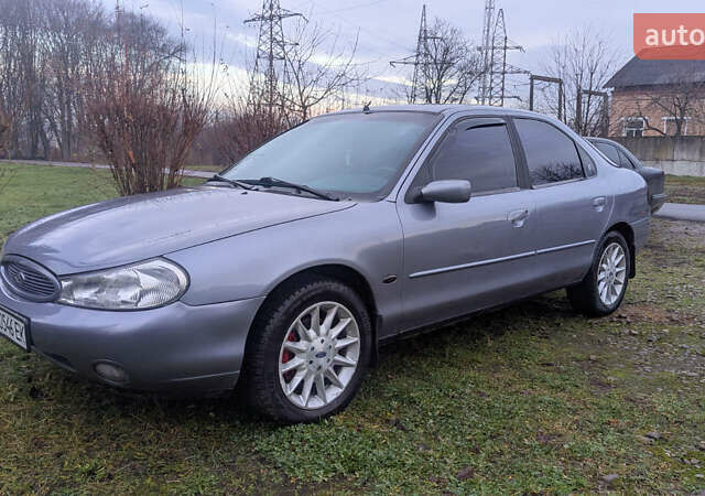 Серый Форд Мондео, объемом двигателя 2.5 л и пробегом 239 тыс. км за 2500 $, фото 1 на Automoto.ua