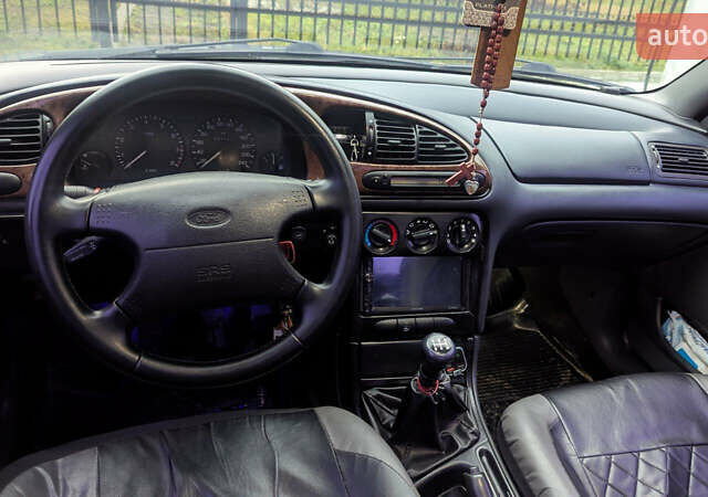 Серый Форд Мондео, объемом двигателя 2.5 л и пробегом 239 тыс. км за 2500 $, фото 9 на Automoto.ua