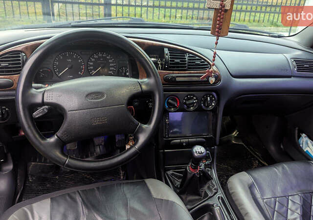 Серый Форд Мондео, объемом двигателя 2.5 л и пробегом 239 тыс. км за 2500 $, фото 7 на Automoto.ua