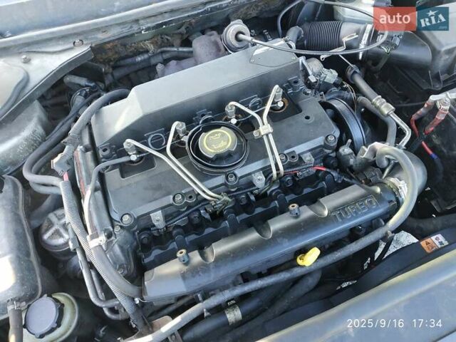 Сірий Форд Мондео, об'ємом двигуна 2 л та пробігом 321 тис. км за 2100 $, фото 54 на Automoto.ua