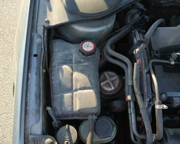 Сірий Форд Мондео, об'ємом двигуна 2 л та пробігом 321 тис. км за 2100 $, фото 56 на Automoto.ua