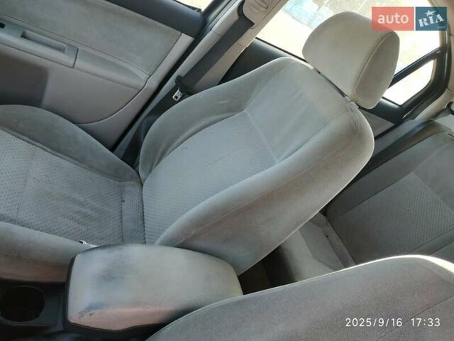Сірий Форд Мондео, об'ємом двигуна 2 л та пробігом 321 тис. км за 2100 $, фото 48 на Automoto.ua