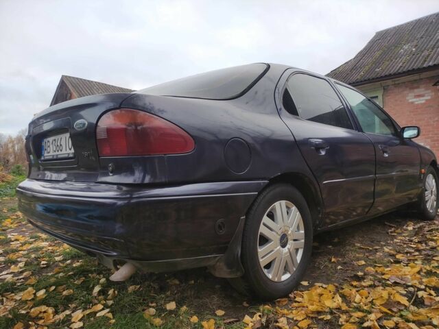 Синій Форд Мондео, об'ємом двигуна 2 л та пробігом 347 тис. км за 2300 $, фото 4 на Automoto.ua