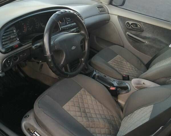 Синий Форд Мондео, объемом двигателя 1.8 л и пробегом 540 тыс. км за 1500 $, фото 4 на Automoto.ua